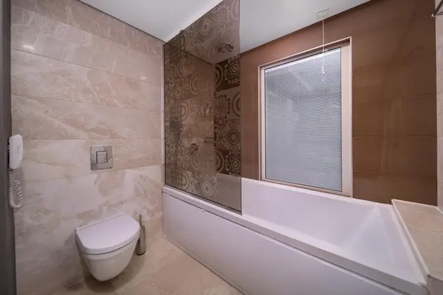 https://images.etstur.com/imgproxy/resize/2560x1440/files/images/hotelImages/etsrooms/516404/Sueno_Hotels_Deluxe_Belek_20251002101109_2.jpg