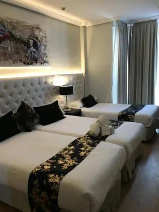 Üç Kişilik Oda