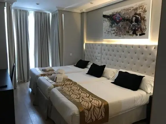 Üç Kişilik Oda