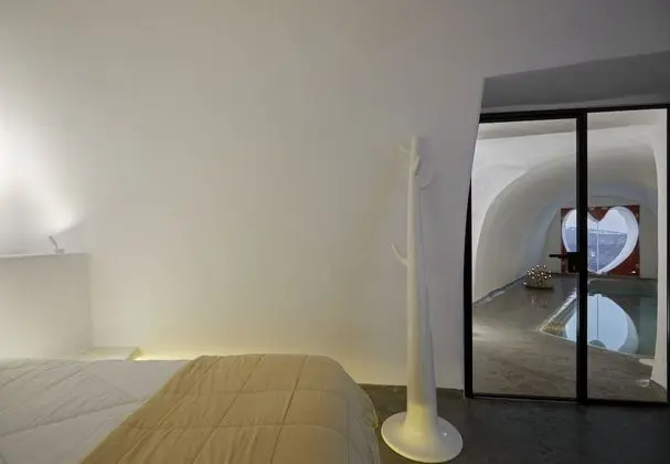 Gods Divine Suite indoor pool with hot tub and Caldera View