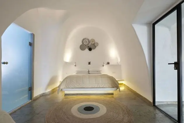 Gods Divine Suite indoor pool with hot tub and Caldera View