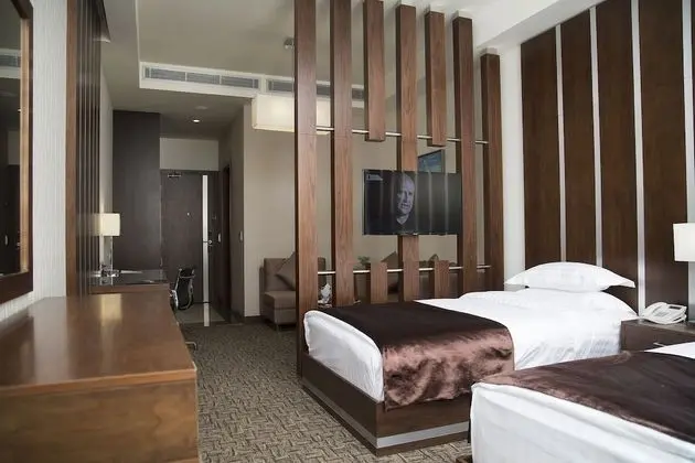 Deluxe Tek Büyük veya İki Ayrı Yataklı Oda