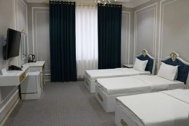 Deluxe Üç Kişilik Oda