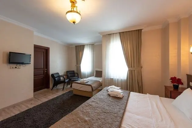 Üç Kişilik Oda
