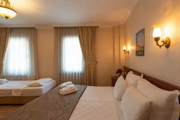 Üç Kişilik Oda