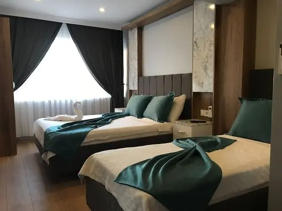 Standard Üç Kişilik Oda, Deniz Manzaralı