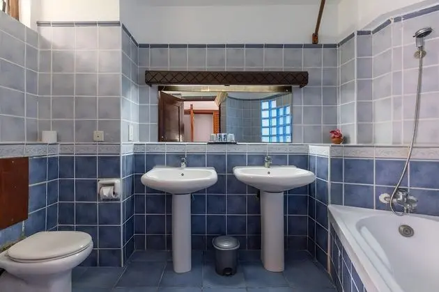 Deluxe Tek Büyük veya İki Ayrı Yataklı Oda