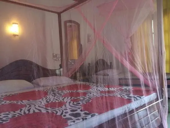 Deluxe Üç Kişilik Oda, 1 Yatak Odası, Bahçe Manzaralı, Plaj Kenarı