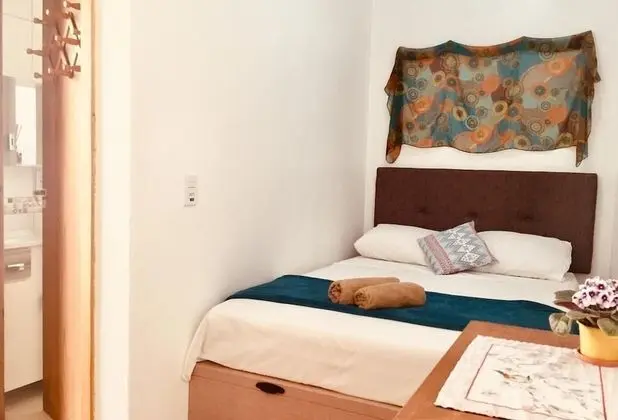 Üç Kişilik Oda