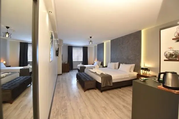 Deluxe Dört Kişilik Oda