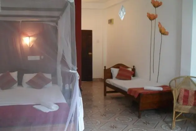 Üç Kişilik Oda, Bahçe Manzaralı