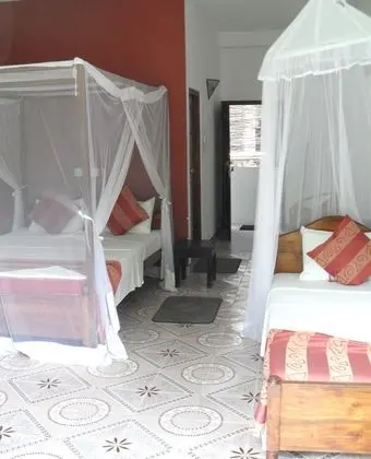 Üç Kişilik Oda, Bahçe Manzaralı