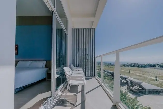Deluxe Tek Büyük Yataklı Oda, Balkon, Deniz Manzaralı (101.102)