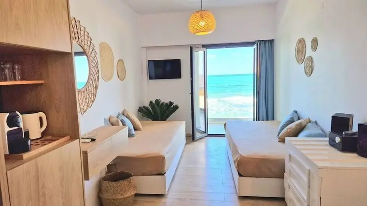 Junior Suite Bedroom & Living Room Sea View
