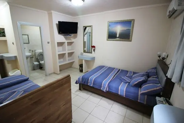 Üç Kişilik Oda