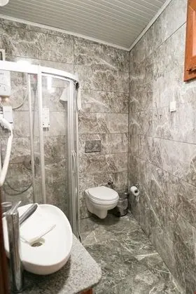 Taş Suit