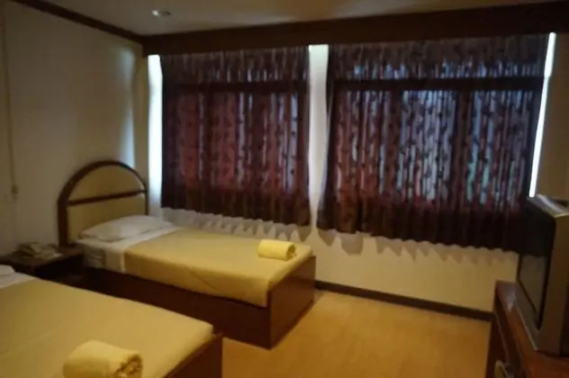 Standard Twin Bed - Aircon Room