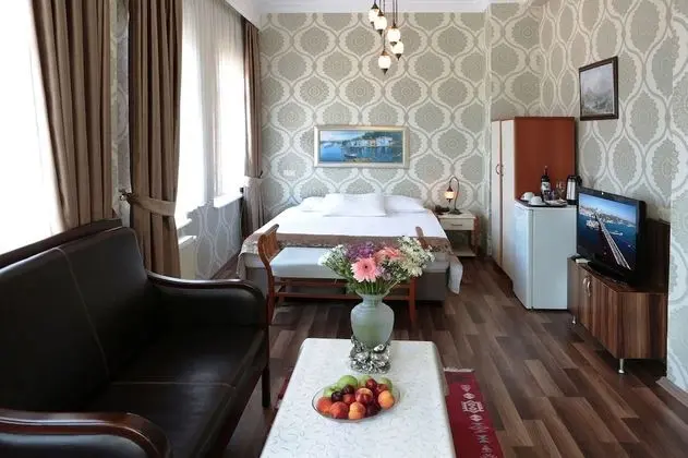 Deluxe Üç Kişilik Oda, Deniz Manzaralı