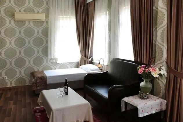 Deluxe Üç Kişilik Oda, Deniz Manzaralı