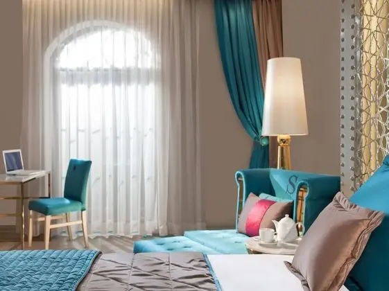 Deluxe Tek Büyük veya İki Ayrı Yataklı Oda