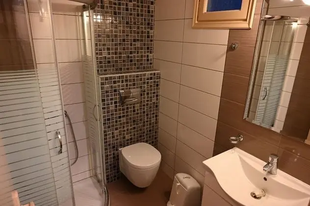 Tek Büyük veya İki Ayrı Yataklı Oda, Bahçe Manzaralı