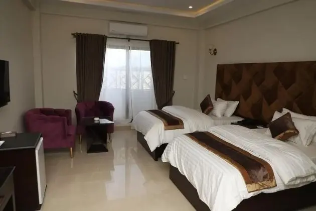 Deluxe Tek Büyük veya İki Ayrı Yataklı Oda