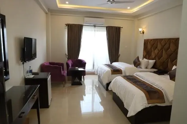Deluxe Tek Büyük veya İki Ayrı Yataklı Oda