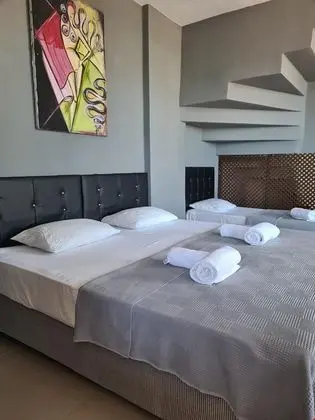 Aile Odası Deniz Manzaralı Üç Kişilik Oda