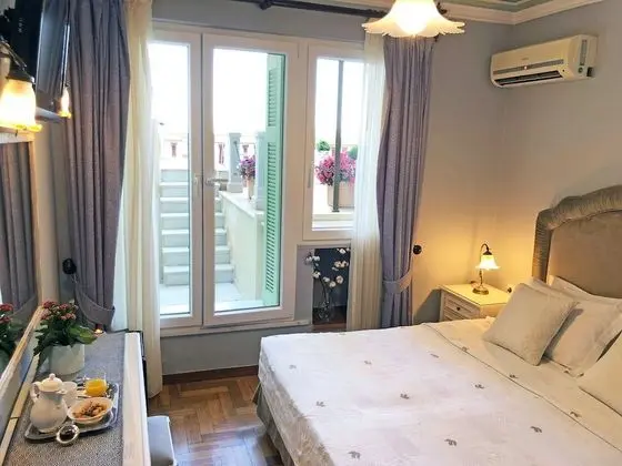 Deluxe Tek Büyük veya İki Ayrı Yataklı Oda