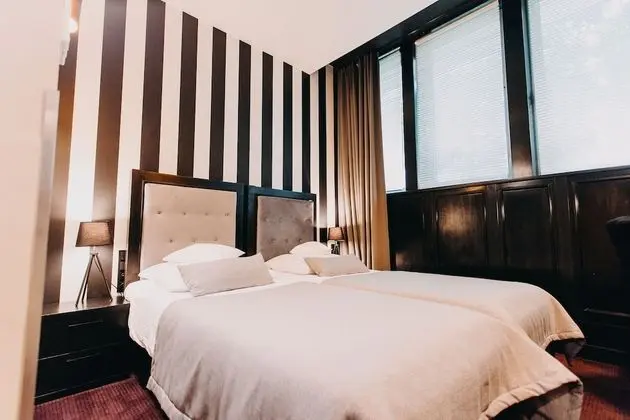 Deluxe Tek Büyük veya İki Ayrı Yataklı Oda