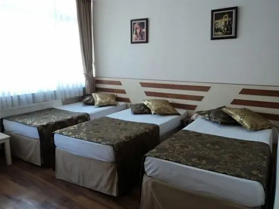 Üç Kişilik Oda