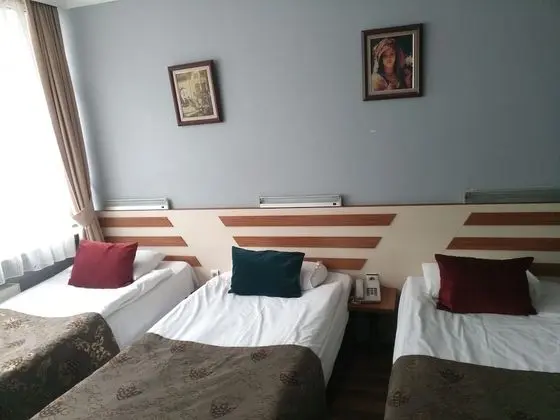 Üç Kişilik Oda