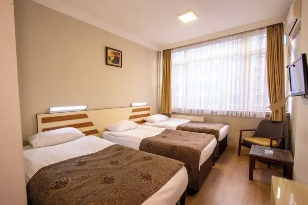 Üç Kişilik Oda