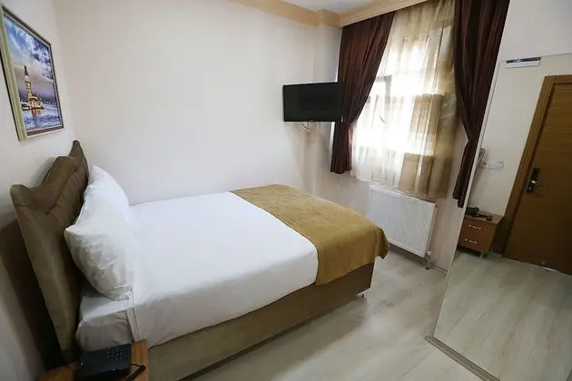 Deluxe Üç Kişilik Oda