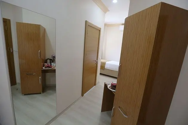 Deluxe Üç Kişilik Oda