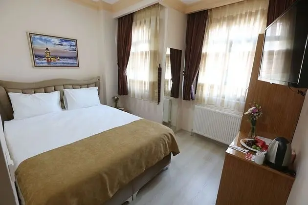 Deluxe Üç Kişilik Oda