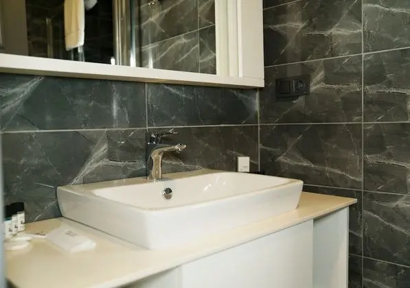 Exclusive Tek Büyük Yataklı Oda