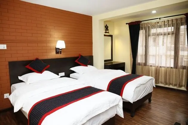 Deluxe Tek Büyük veya İki Ayrı Yataklı Oda