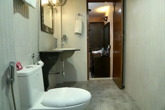 Deluxe Tek Büyük veya İki Ayrı Yataklı Oda