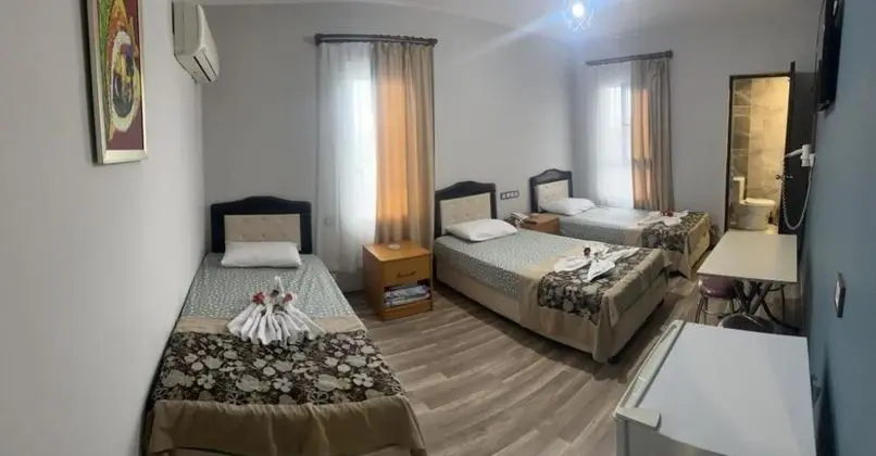 Standard Triple Bahçe Manzaralı Oda