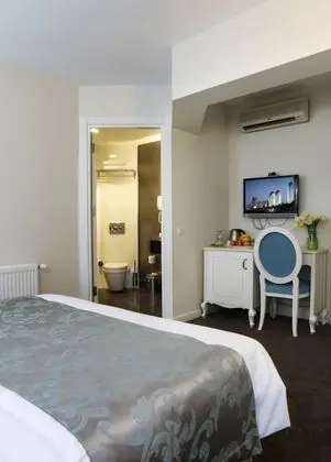 Deluxe Tek Büyük veya İki Ayrı Yataklı Oda