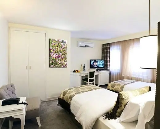 Deluxe Tek Büyük veya İki Ayrı Yataklı Oda