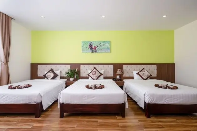 Deluxe Üç Kişilik Oda, Kısmi Deniz Manzarası