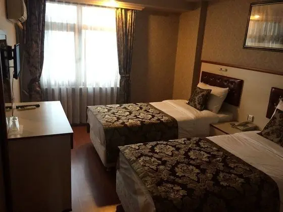 Üç Kişilik Oda