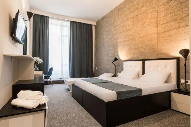 Deluxe Tek Büyük veya İki Ayrı Yataklı Oda