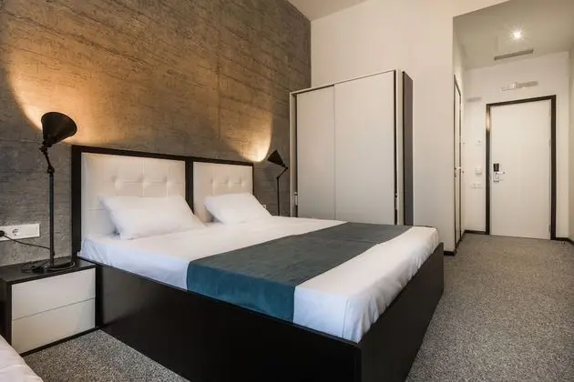 Deluxe Tek Büyük veya İki Ayrı Yataklı Oda
