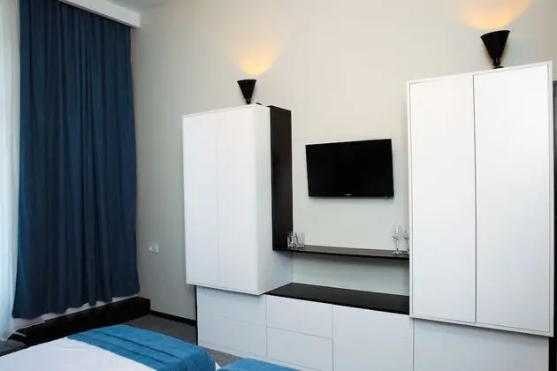 Deluxe Tek Büyük veya İki Ayrı Yataklı Oda