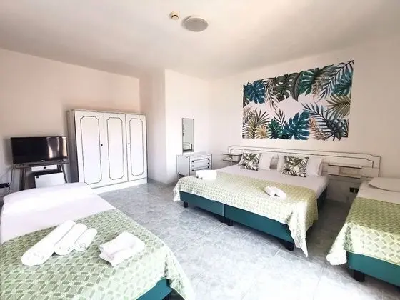 Deluxe Dört Kişilik Oda