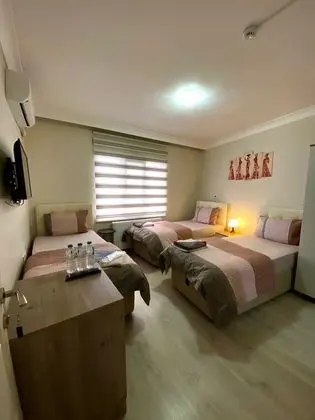 Üç Kişilik Oda