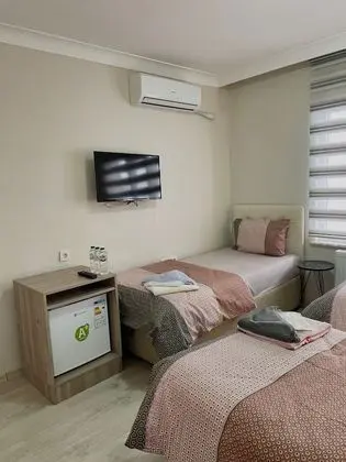 Üç Kişilik Oda